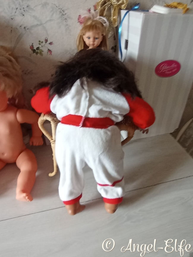 Bébé Famosa, Un petit trésor à la peau brune, pleine de charme et de caractère.