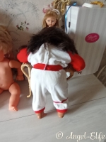 Bébé Famosa, Un petit trésor à la peau brune, pleine de charme et de caractère.